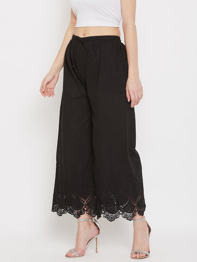Black straight embroidered palazzo with elasticated waistband.