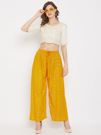 Mustard printed rayon palazzo with a sassy look for social functions.