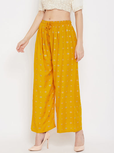 Mustard printed rayon palazzo with stylish pattern.