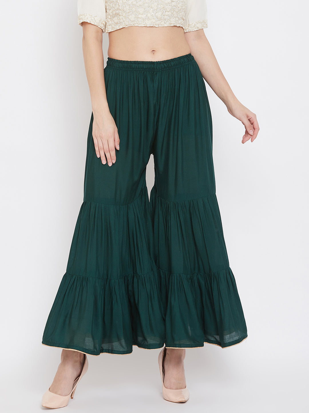 Bottle Green Flared Solid Gharara with layered design and elastic waistband.