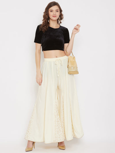 Cream printed rayon gharara with floral design, lightweight and comfortable.