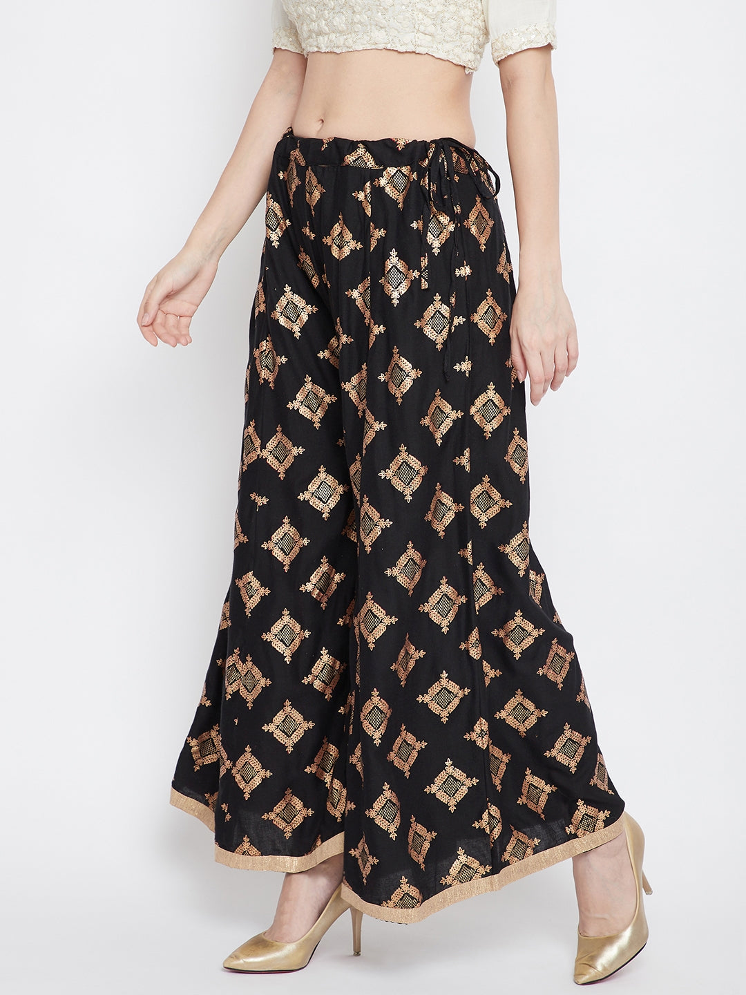 Black wide leg printed sharara with geometric pattern.