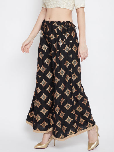 Black wide leg printed sharara with geometric pattern.