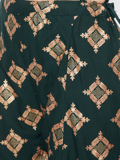 Bottle green wide leg printed sharara with gold geometric patterns.