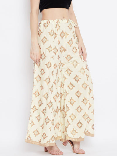 Cream wide leg printed sharara with geometric patterns.