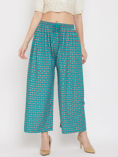 Turquoise straight printed palazzo with drawstring waist.
