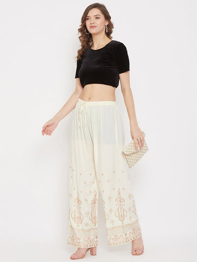 Cream printed rayon palazzo with elegant design and comfortable fit.