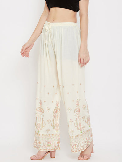 Cream printed rayon palazzo with light, comfortable design.