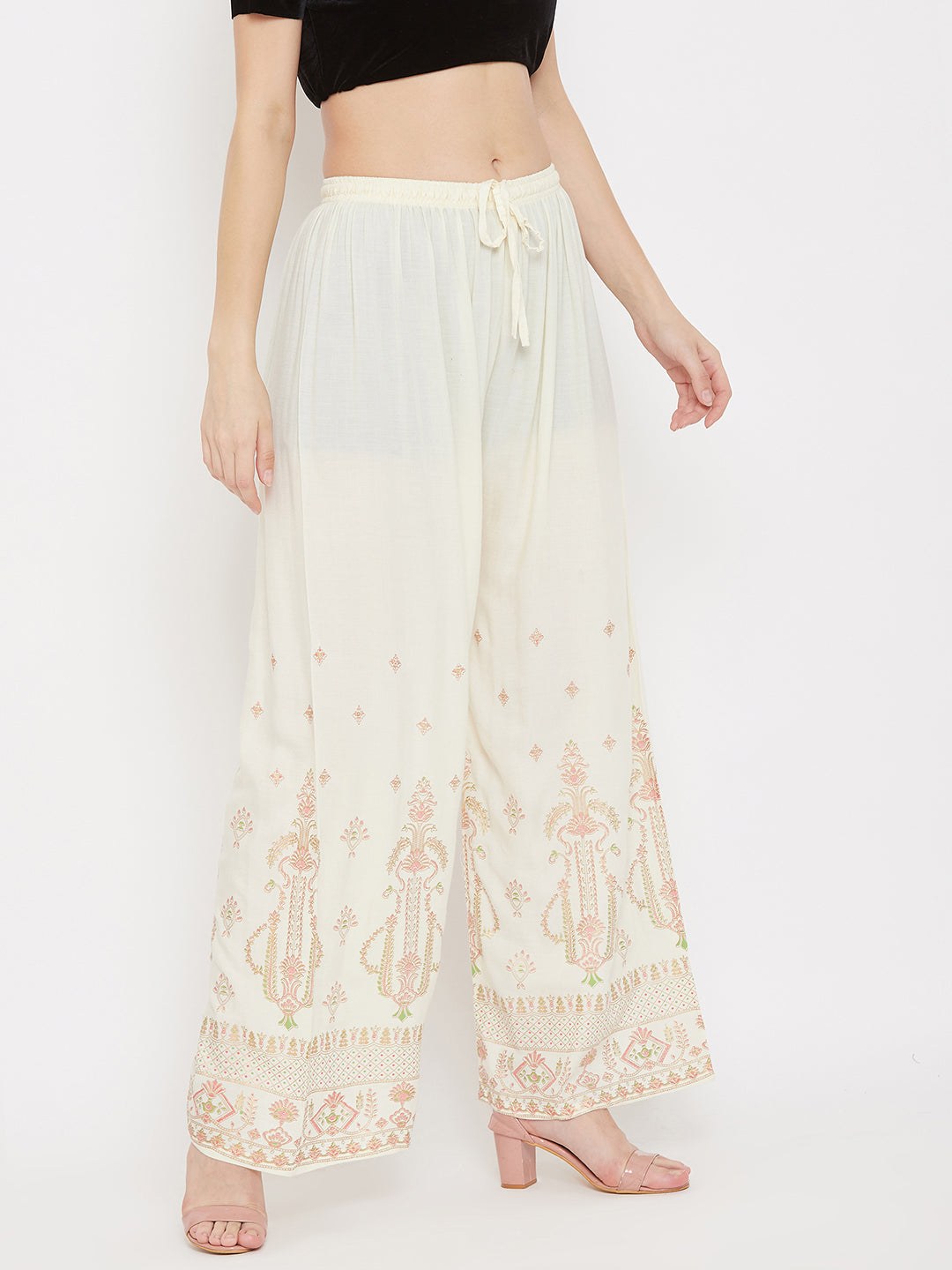 Cream printed rayon palazzo with elegant design and comfortable fit.