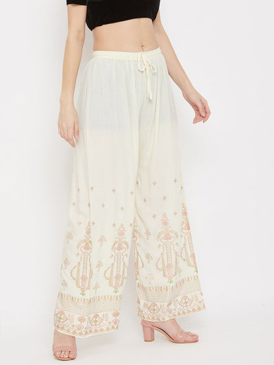 Cream printed rayon palazzo with elegant design and comfortable fit.