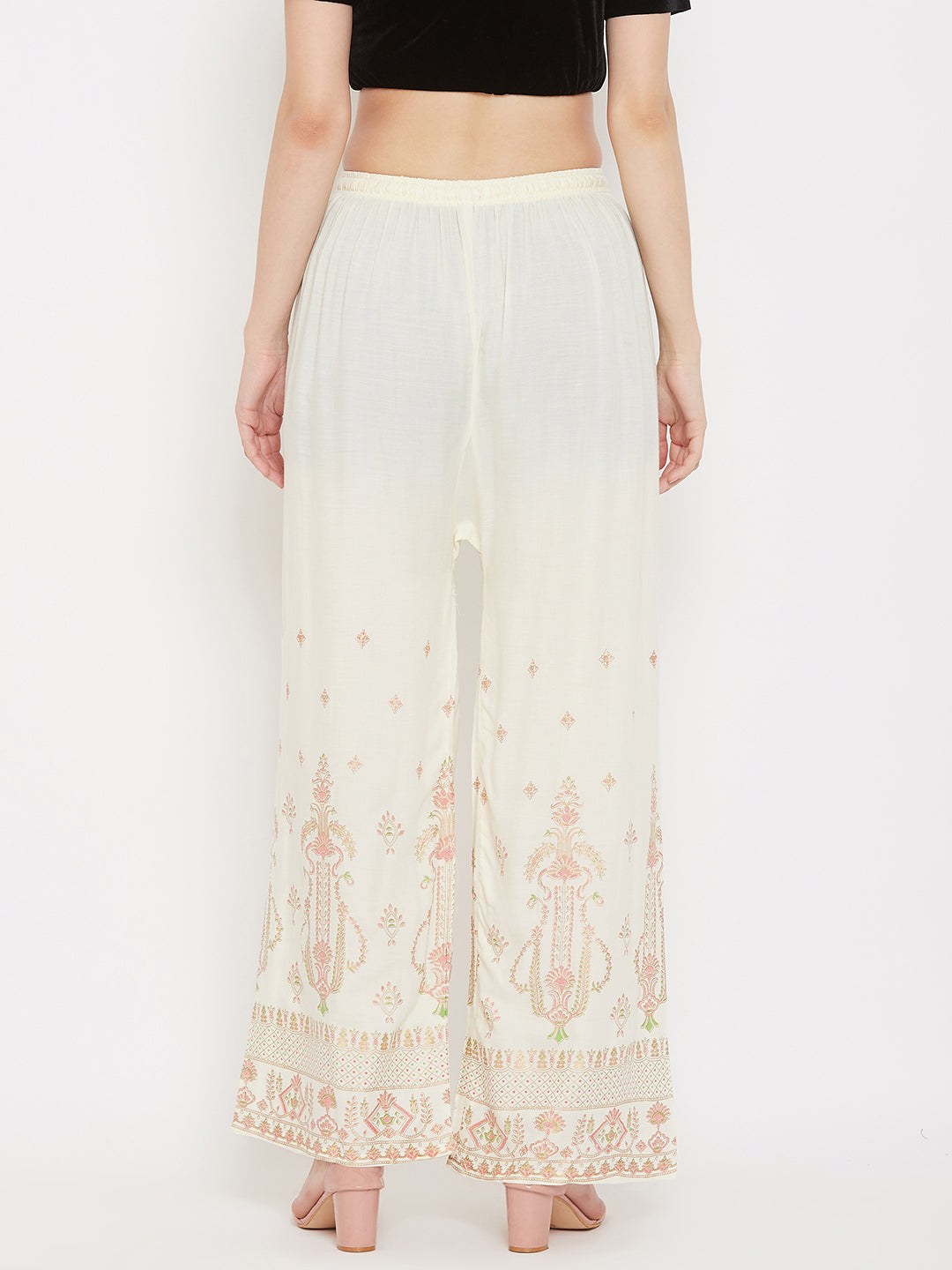 Cream printed rayon palazzo pants with a comfortable fit, from Clora.