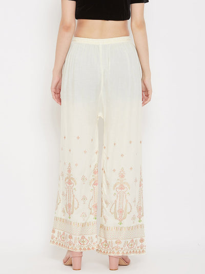 Cream printed rayon palazzo pants with a comfortable fit, from Clora.