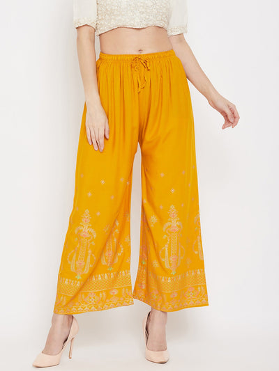 Mustard printed rayon palazzo pants from Clora, lightweight and comfortable.