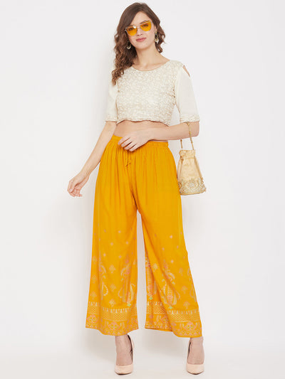 Mustard printed rayon palazzo featuring a light and comfortable design.
