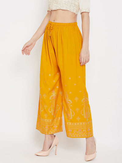 Mustard printed rayon palazzo, lightweight and comfortable for all-day wear.