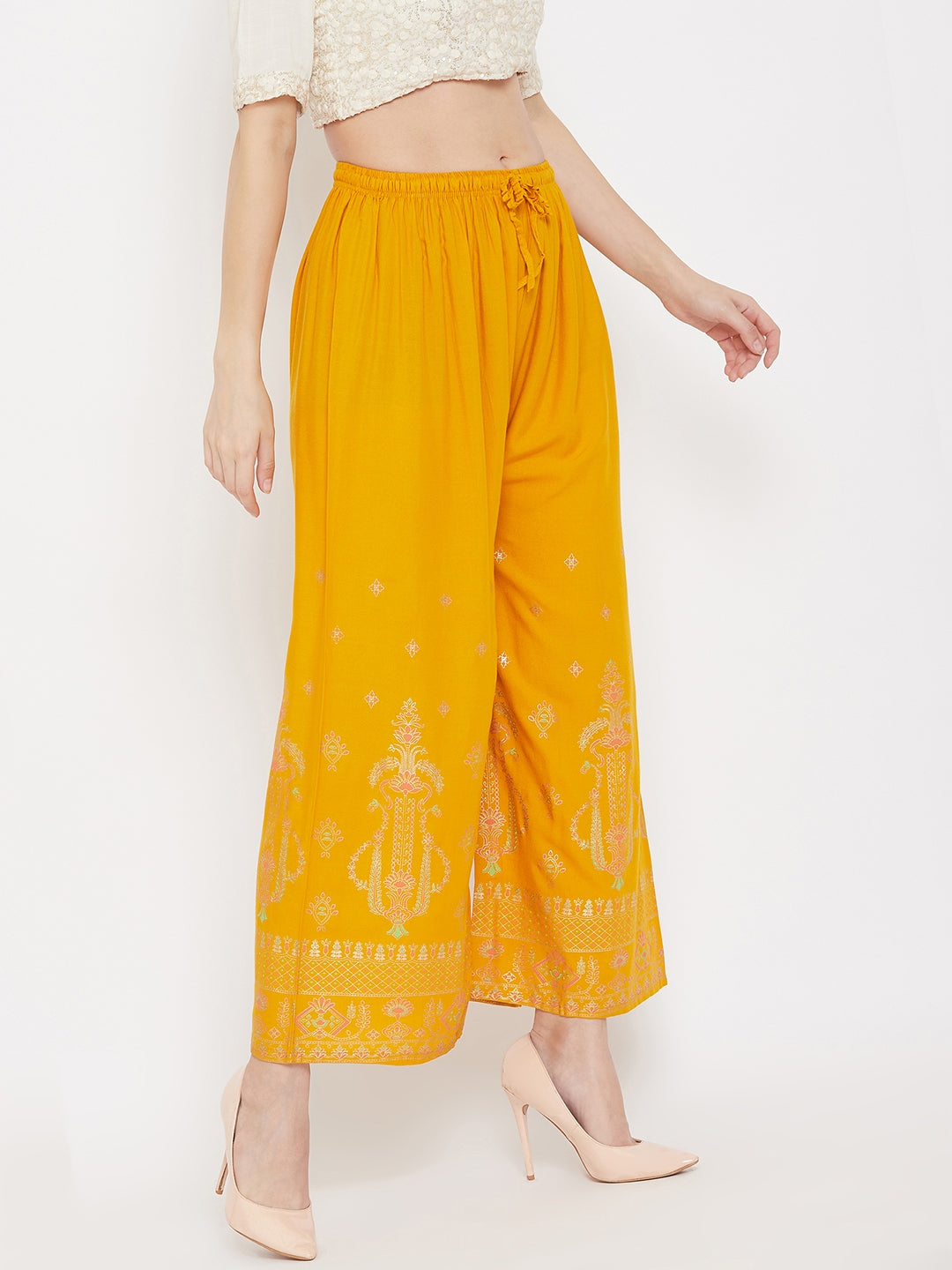 Mustard printed rayon palazzo with comfortable fit and lightweight fabric.