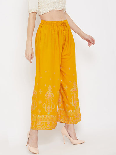 Mustard printed rayon palazzo with comfortable fit and lightweight fabric.
