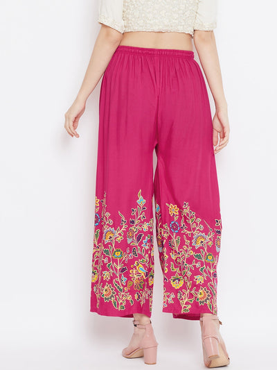 Magenta hem design straight palazzo with floral patterns.