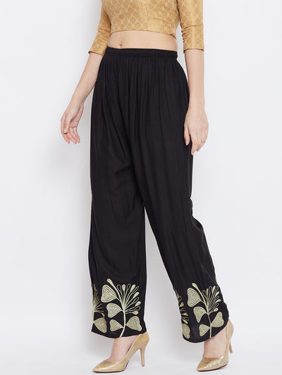 Black hem design straight palazzo made from lightweight rayon for comfort.