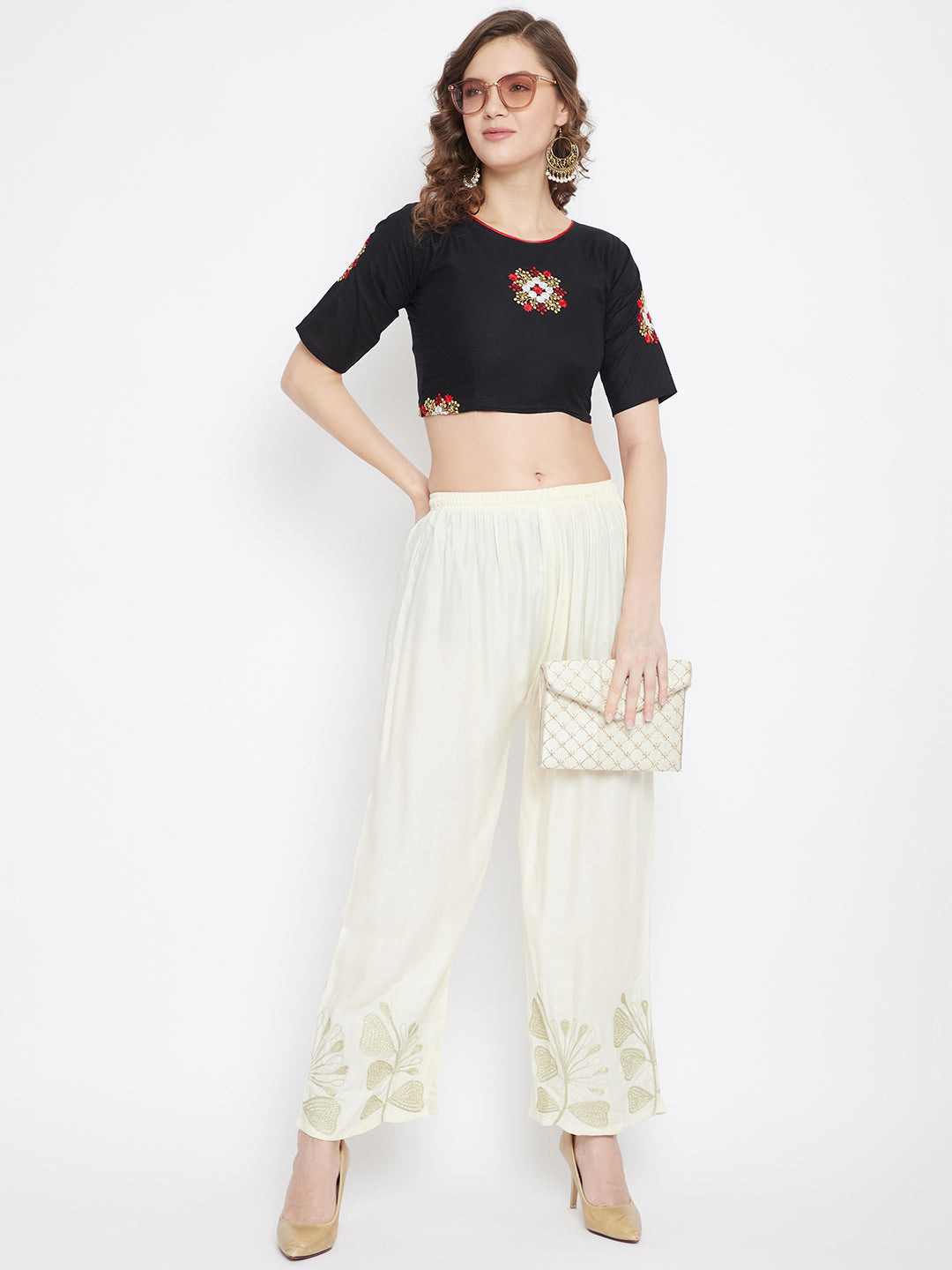 Cream hem design straight palazzo in light fabric worn by a woman.