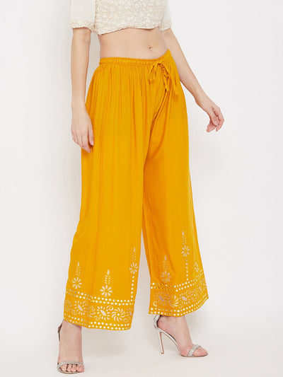 Mustard wide leg hem design palazzo with floral detailing, comfortable rayon fabric.