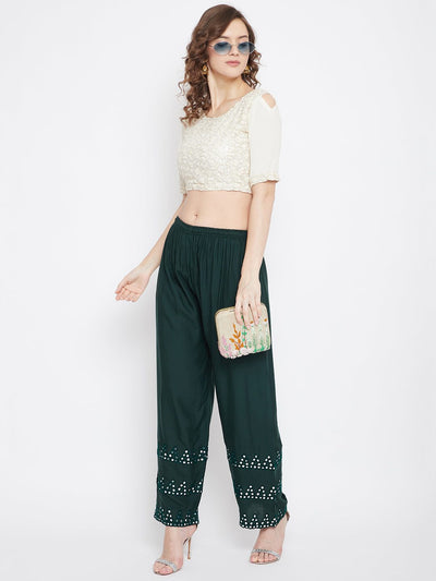 Bottle Green Straight Hem Design Palazzo by Clora, worn by a model with a white top.