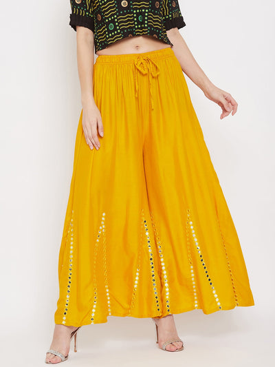 Mustard flared embellished sharara with lightweight rayon fabric.