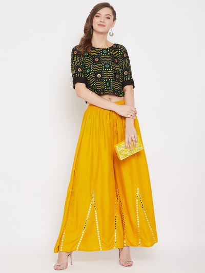 Mustard flared embellished sharara with comfortable fit.