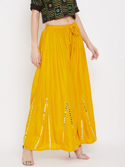 Mustard flared embellished sharara in lightweight rayon fabric.