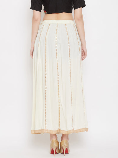Cream Gotta Patti Flared Skirt in Rayon fabric with decorative stitching, ideal for pairing with a blouse and high heels.