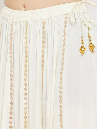 Cream Gotta Patti flared skirt with rayon fabric and decorative detailing.