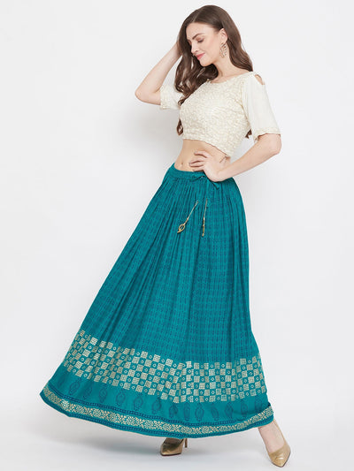 Turquoise printed rayon skirt for women with flared design.