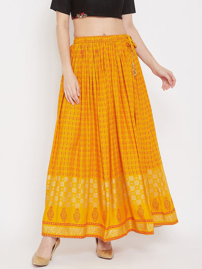 Mustard printed rayon flared skirt for women.