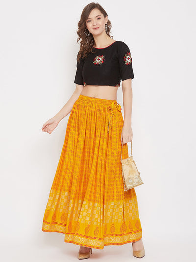 Mustard printed rayon skirt for women, flared and stylish.