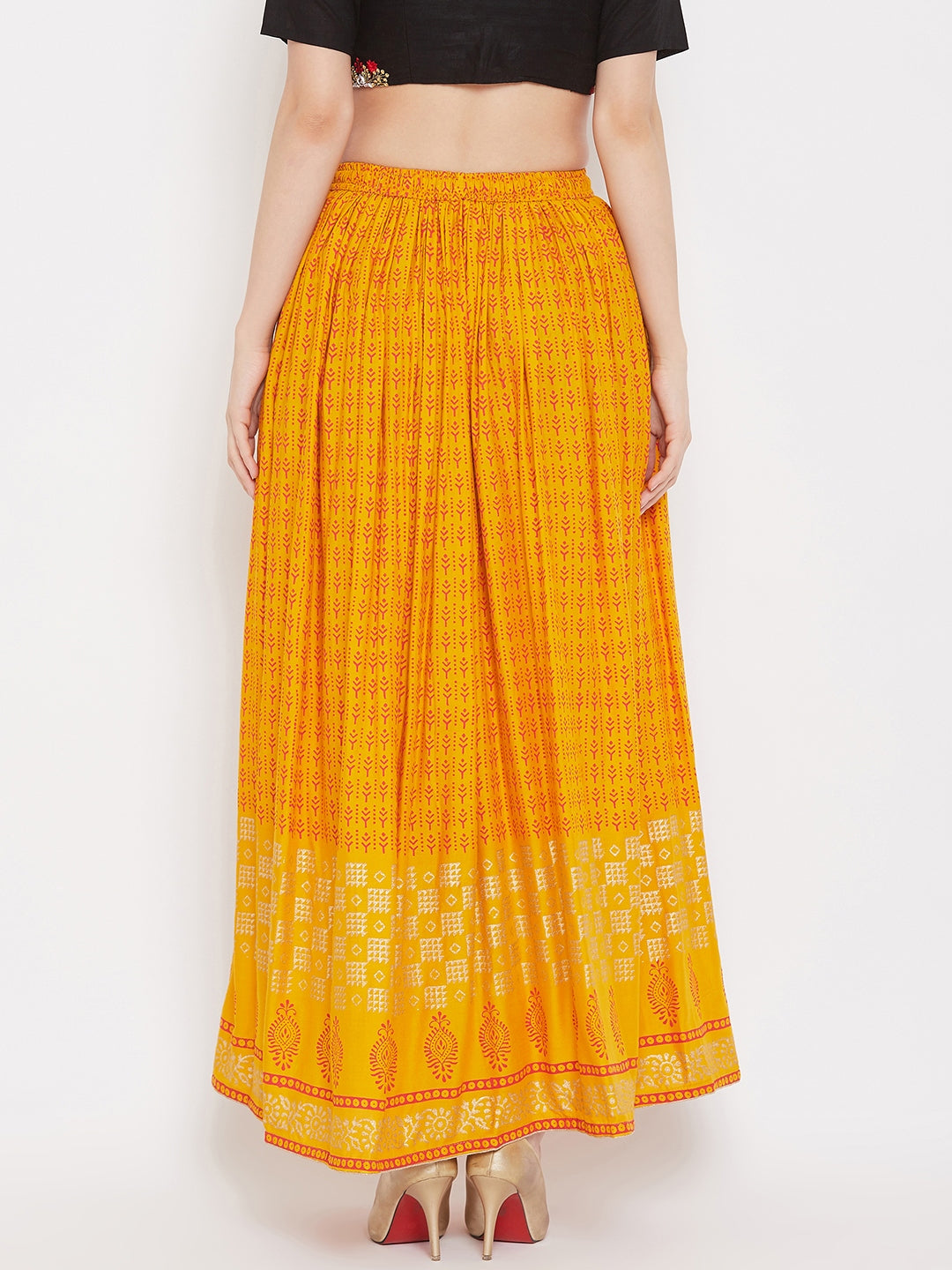 Mustard printed rayon flared skirt for women by Clora.
