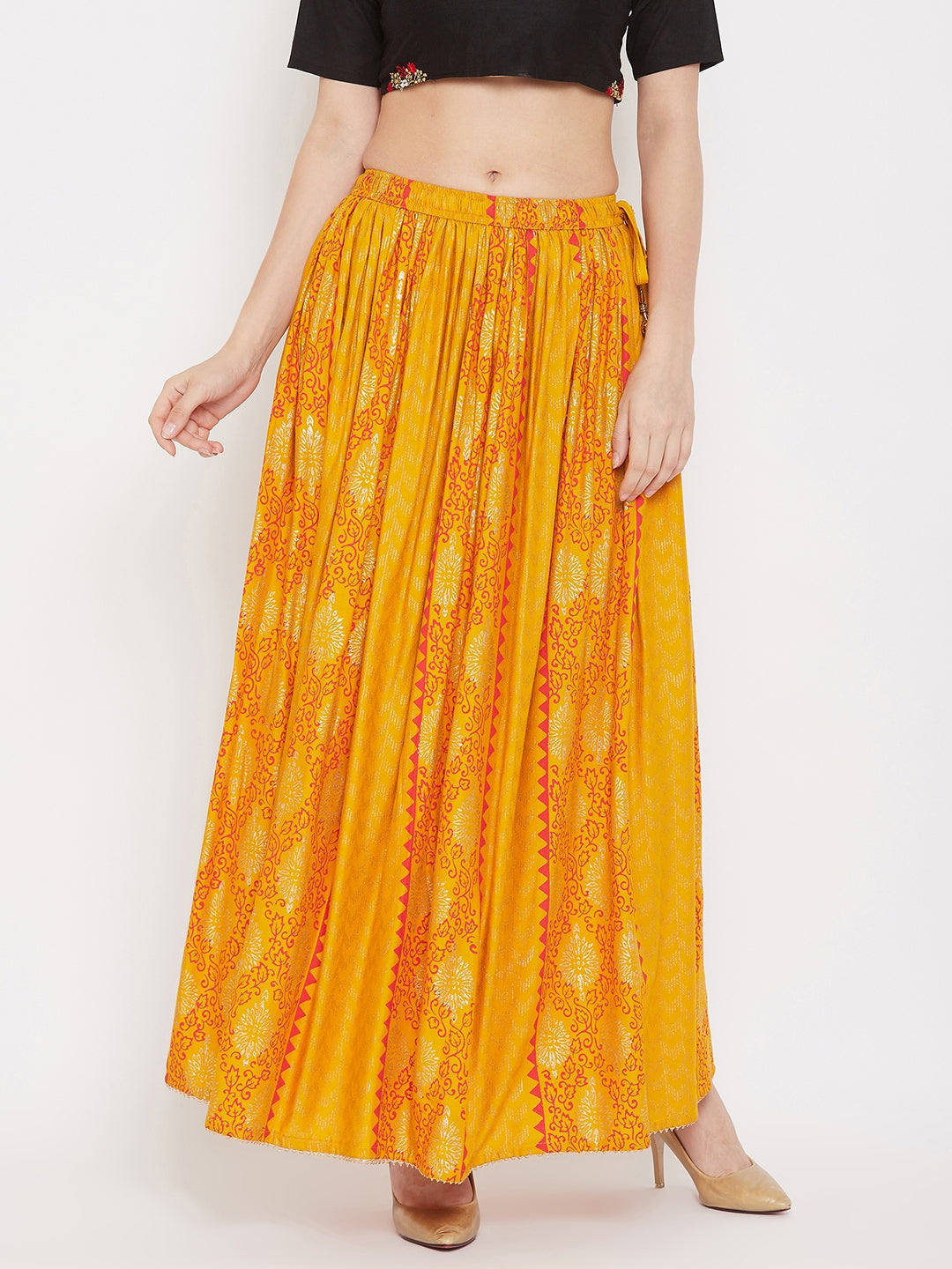 Mustard printed rayon maxi skirt for women, flared design.