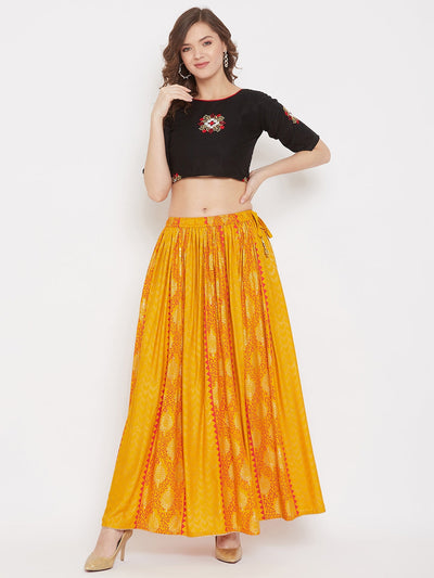 Mustard printed rayon maxi skirt for women, flared and styled for comfort and elegance.