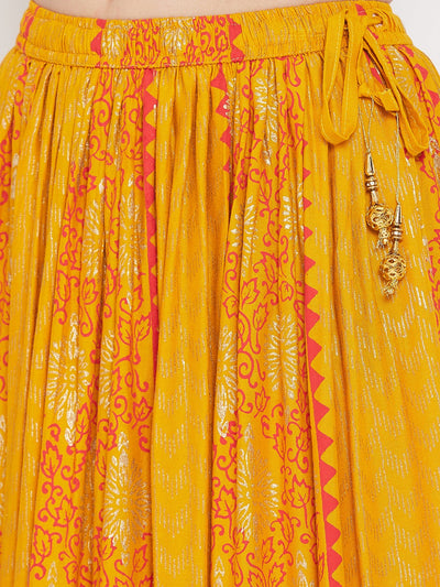 Mustard printed rayon maxi skirt with intricate design.