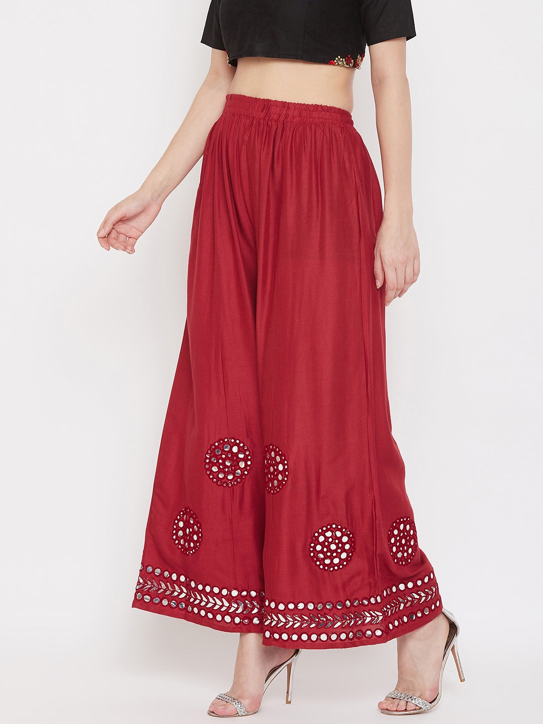 Maroon mirror work rayon sharara with elasticated waist and stylish design.