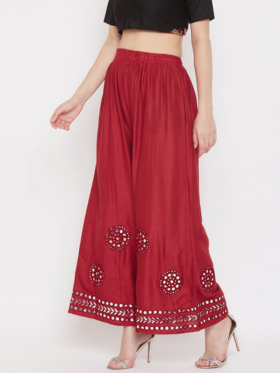 Maroon mirror work rayon sharara with elasticated waist and stylish design.