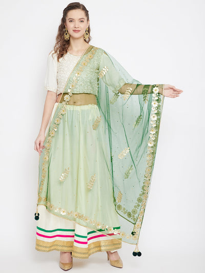 Green Gotta Patti net dupatta styled with kurta palazzo set.