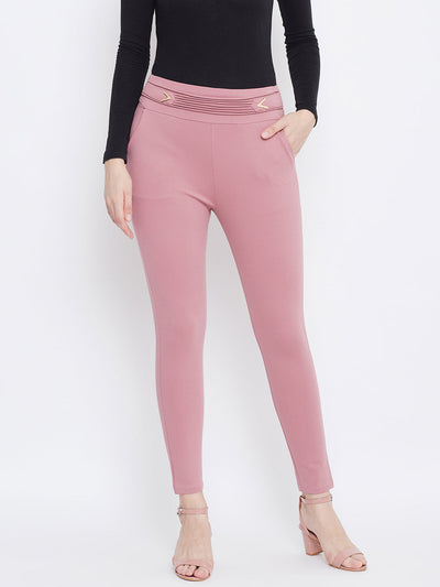 Pink solid jeggings with elastic waistband, made from NR Roma fabric.