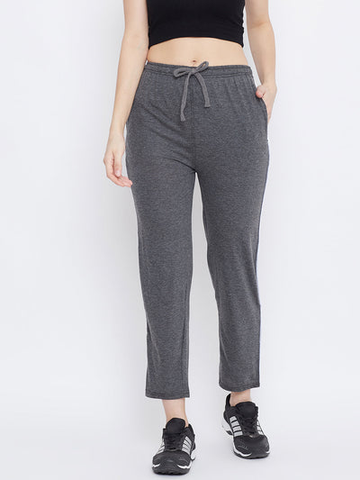 Dark grey straight fit trackpants for women in lightweight hosiery fabric.