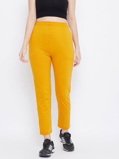 Mustard straight fit trackpants for women in hosery fabric.