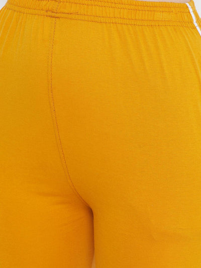 Mustard straight fit trackpants for women made from lightweight hosiery fabric.