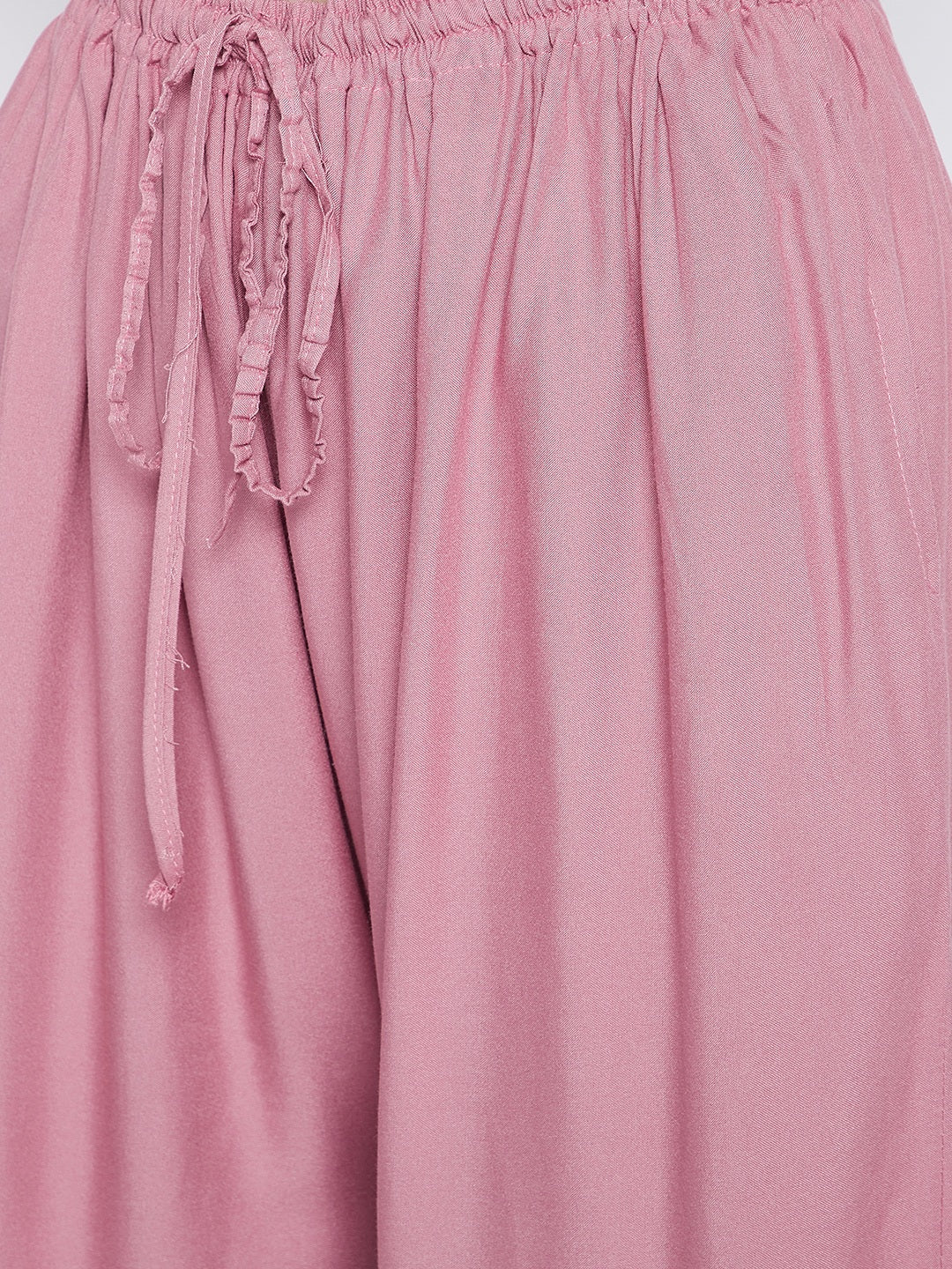 Light pink solid rayon sharara with drawstring detail.
