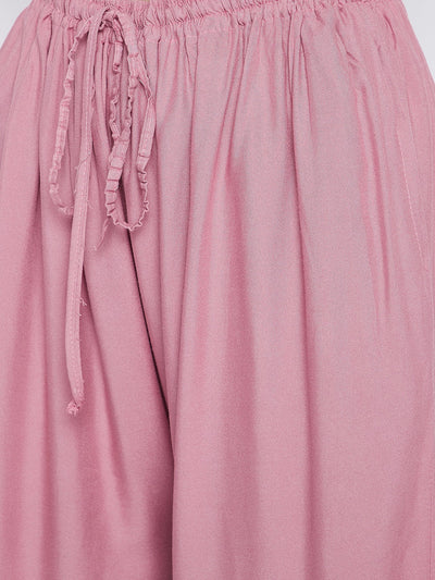 Light pink solid rayon sharara with drawstring detail.