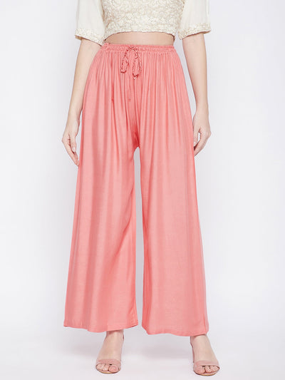 Peach solid rayon palazzo pants, lightweight and comfortable for all-day wear.