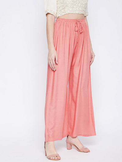 Peach solid rayon palazzo, lightweight and comfortable for all-day wear.