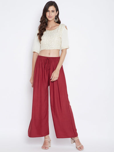 Rust solid rayon palazzo, lightweight and comfortable, worn by a model.